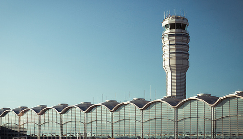 Passengers walk through the airport terminal at Ronald Reagan