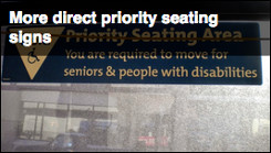 More direct priority seating signs